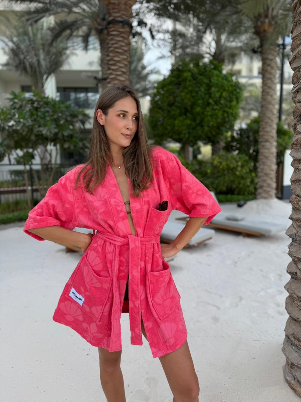 Bold red beach robe after swim Zero Gravity Dubai — Mermaids Club