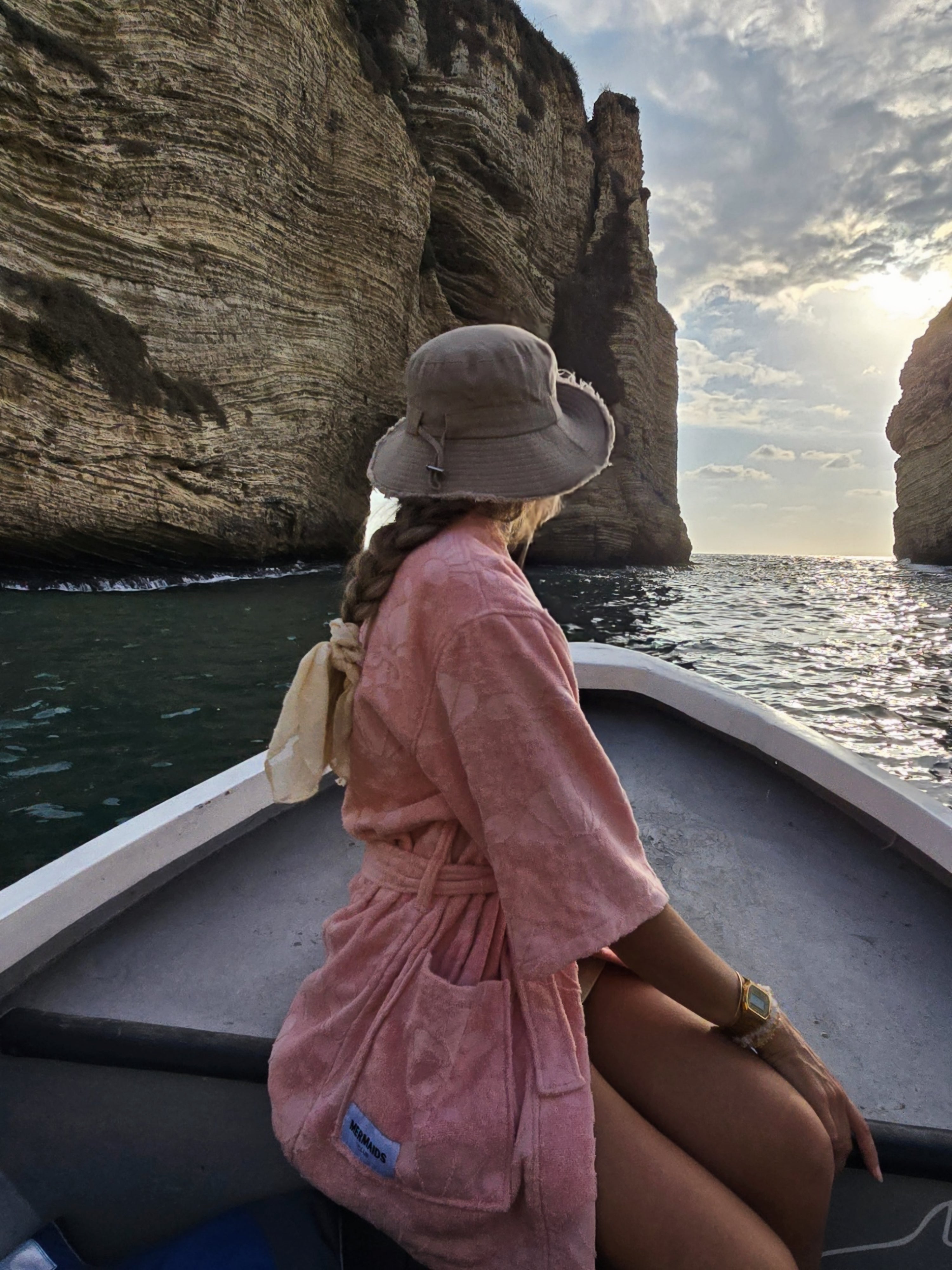 Woman wearing pink V-neck beach robe Raouche Lebanon — Mermaids Club