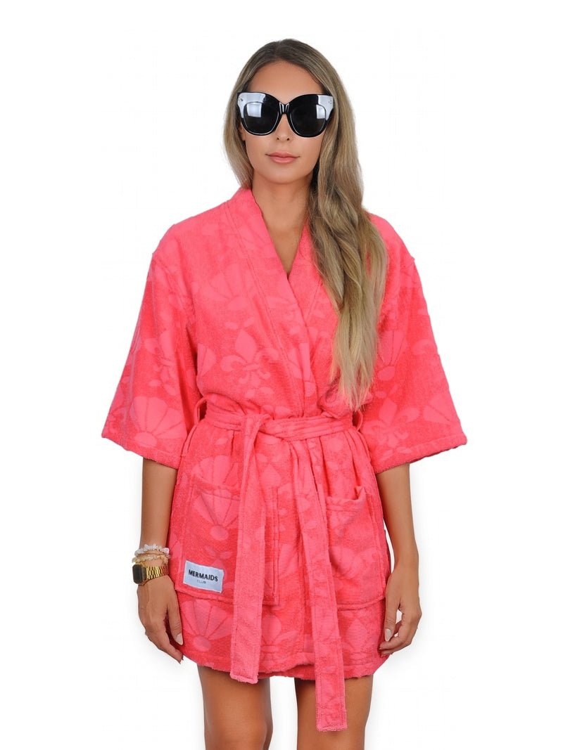 Woman wearing red V-neck beach robe UAE — Mermaids Club